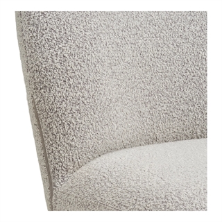 Detalje af Lana spisebordsstol i sandfarvet bouclé med grå drejefod fra House Nordic.