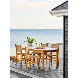 Miljøbillede med Derby lænestol uden armlæn i teak/polyrattan fra House nordic.