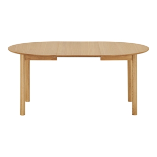 Bundaberg Spisebord i eg med 2 tillægsplader fra House Nordic - her vist med 1 tillægsplade isat.