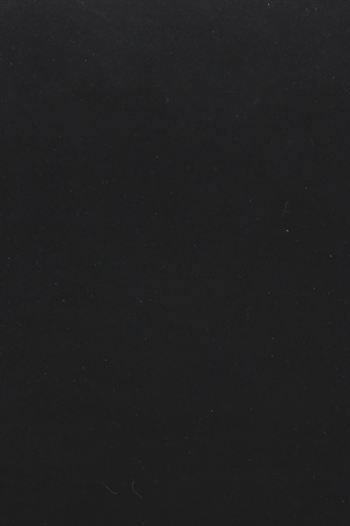 Det sorte comfort stof set tæt på.