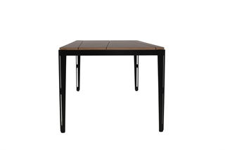 Mødebord i sort linoleum set fra enden af.