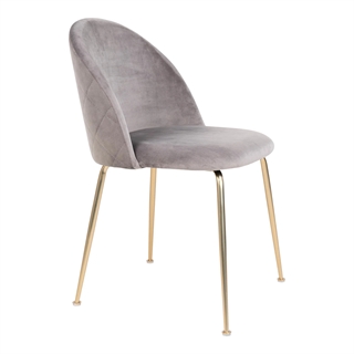 Geneve stol i grå velour med messing stel set fra siden af.