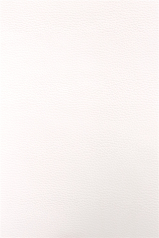 Det hvide kunstlæder set tæt på.