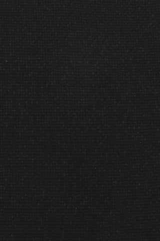 Det sorte fame stof set tæt på.