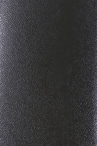 Armlænets PUR materiale set tæt på.