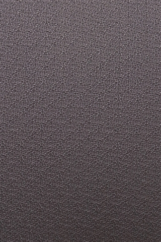 Det lysegrå stof set tæt på.