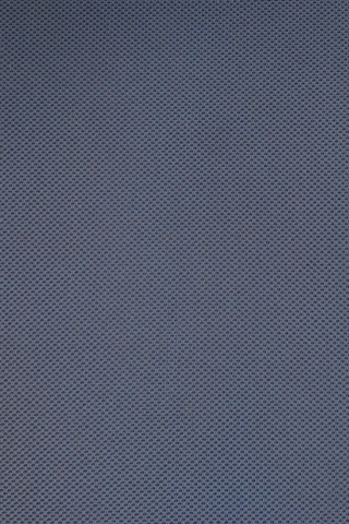 Stoffet i mellem blå på sædet set tæt på.