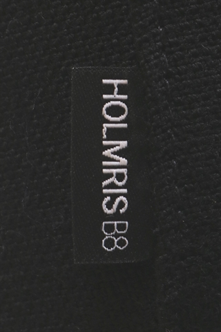 Mærket set tæt på.